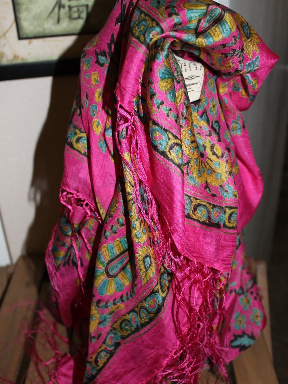Bright silk scarf.